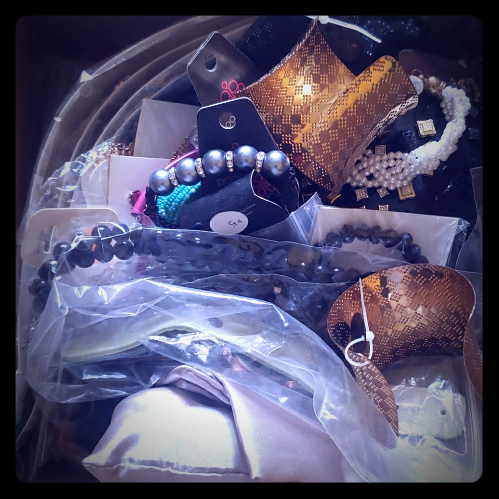 A box of Jewelry and accessories